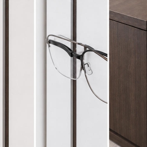 Close-up matte white vertical slat partition thin metal frame holder dark solid wood central counter texture
