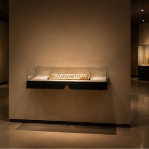 Wall-Mounted Horizontal Manuscript Display Case | Museum Showcase 3 Wall-mounted manuscript display case in museum setting