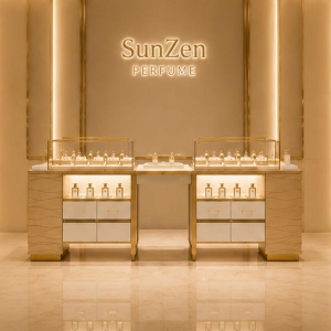 Perfume Display Island | Lit Scent Glass Cabinet - Sunzen 3 Real shot dual perfume display island inside boutique