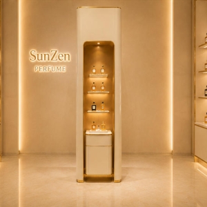 Tall Vertical Scent Tower | Slim Backlit Perfume Rack - Sunzen 3 Front real shot tall vertical scent tower installed inside niche perfume boutique