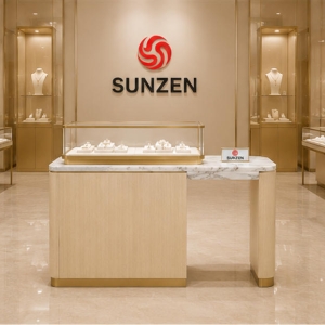 Corner Glass Jewelry Cabinet | Wall Corner Jewelry Counter - Sunzen 5 Premium jewelry display table placed inside a high-end jewelry boutique