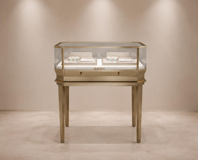 Octagon glass counter four tapered slim gold leg jewelry table with front drawer