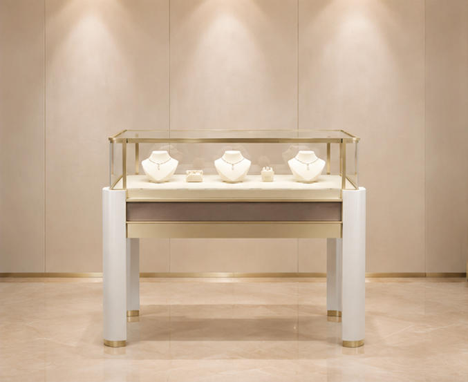Thick leg four post jewelry table with fabric drawer front gold trim glass cabinet