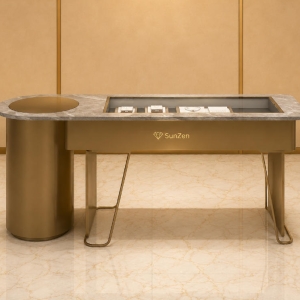Jewelry Marble Oval End Recessed Glass Display Counter | Bronze Cylinder V-Leg Asymmetrical Retail Showcase – Sunzen 2 Jewelry Marble Oval End Recessed Glass Display Counter | Bronze Cylinder V-Leg Asymmetrical Retail Showcase – Sunzen