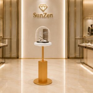 Jewelry Dome Top Pedestal Stand | Gold Pole Round Dome Watch Display Tower – Sunzen 6 Real Installation Shot In Minimalist Luxury Watch Jewelry Boutique Window