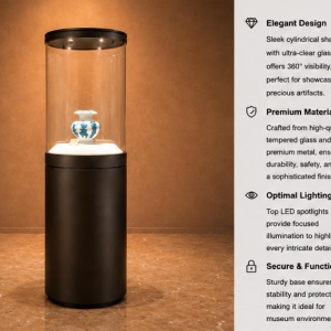 Feature close-up of full-height cylindrical UV glass, top built-in LED spotlights, white ceramic plinth of single pottery exhibit tower