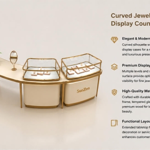 Close-up dual independent gold rim tabletop glass vitrines, curved cream consultation table, matching vanity mirror on curved consultation counter slim gold leg booth