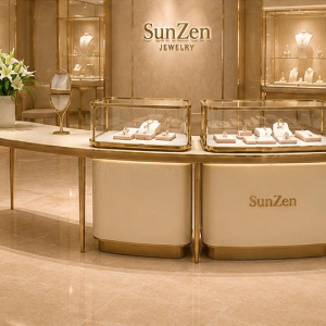 On-site render curved consultation counter combined client display station installed as VIP reception zone inside cream-gold luxury jewelry boutique