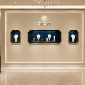 Luxury Jewelry Octagon Wall Cabinet | Beige Gold Frame Blue Velvet Display Niche – Sunzen 6 Real Installation Shot In High-End Luxury Jewelry Boutique
