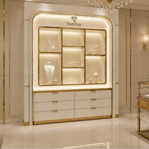 Jewelry Grid Wall Cabinet | White Curved Gold Trim Multi-Drawer Display Unit – Sunzen 6 Real Installation Shot In Minimalist Light Luxury Jewelry Boutique