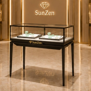 Jewelry slim metal jade table | Minimalist Tall Leg Glass Retail Showcase – Sunzen 6 Real Installation Shot In Minimalist New Chinese Jade Fine Jewelry Boutique Storefront Window & Entrance Passage Focal Zone