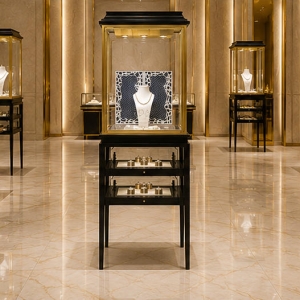 Jewelry Tall Display Stand | Black Wood Gold Frame Double Layer Vertical Showcase - SUNZEN 6 Real Installation Shot Of Black Wood Gold Frame Double Layer Jewelry Tall Display Stand In Retro Light Luxury Fine Jewelry Boutique Entrance Window Focal Zone