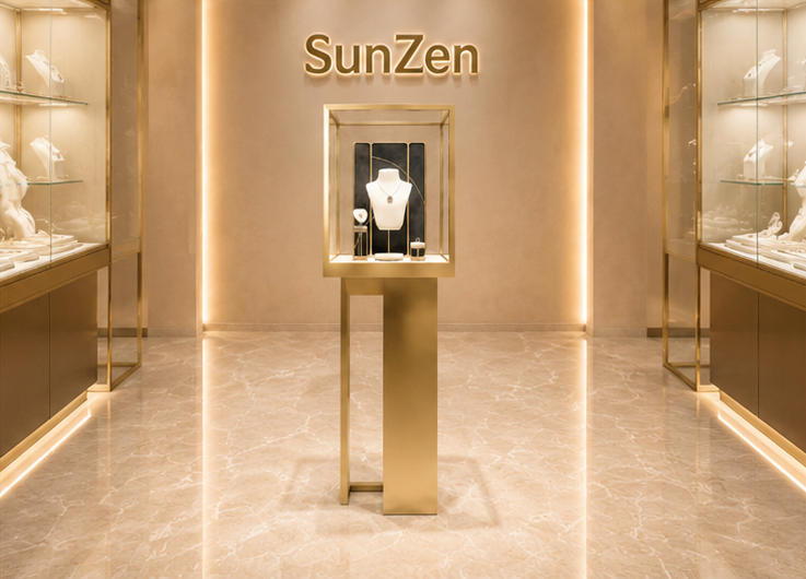 Full vertical render standalone floor jewel tower lockable tall gold vitrine with built-in necklace display stand for boutique window focal jewelry showcase
