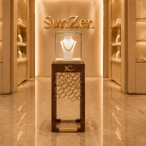 Wood Jewelry Pedestal | Cutout Metal Tall Necklace Booth - Sunzen 3 Full vertical render single carved display tower wood jewelry pedestal lockable tall necklace booth for boutique entrance focal jewelry display