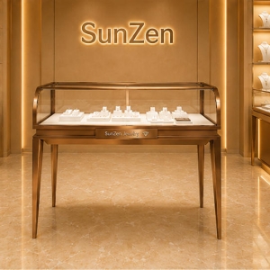 Curved Top Jewelry Counter | Rose Gold Glass Cabinet Horizontal Jewel Booth – Sunzen Display 3 Front real shot of curved top rose gold horizontal jewel booth inside Sunzen fine jewelry retail boutique