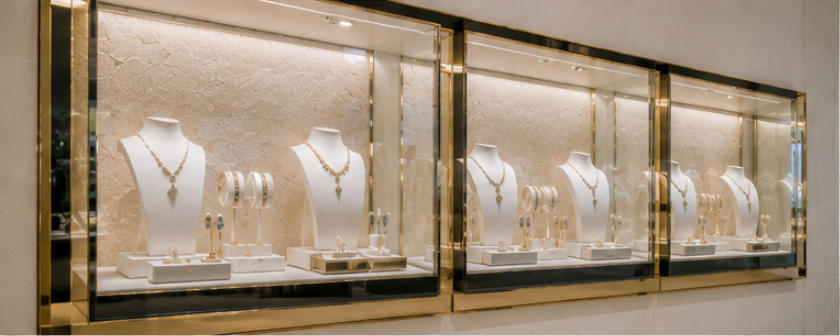 Boucheron low-profile gilded black glass display cases