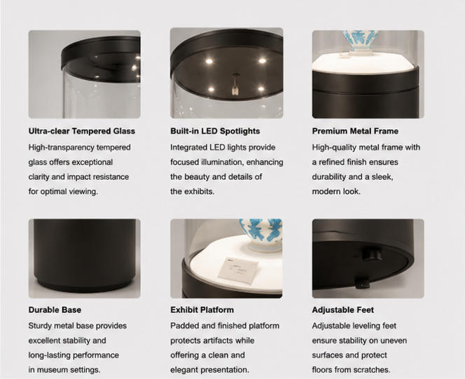 Material craft close-up of matte dark grey cylindrical cabinet, seamless vertical circular tempered UV glass, solid white archival display riser