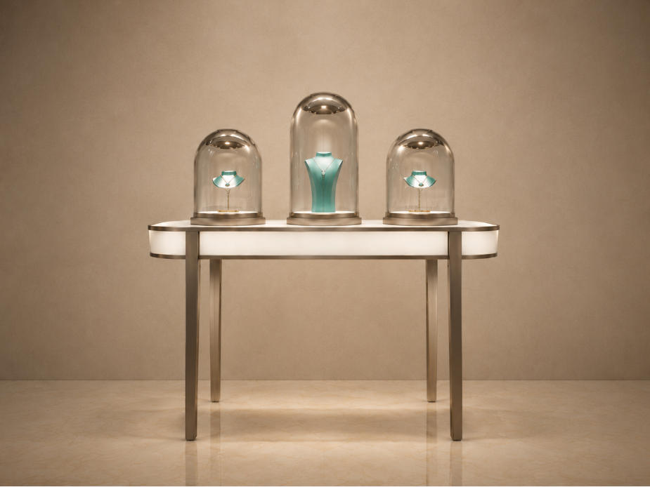 Oval top dome glass jewelry table with four slim rose gold thin legs three dome covers