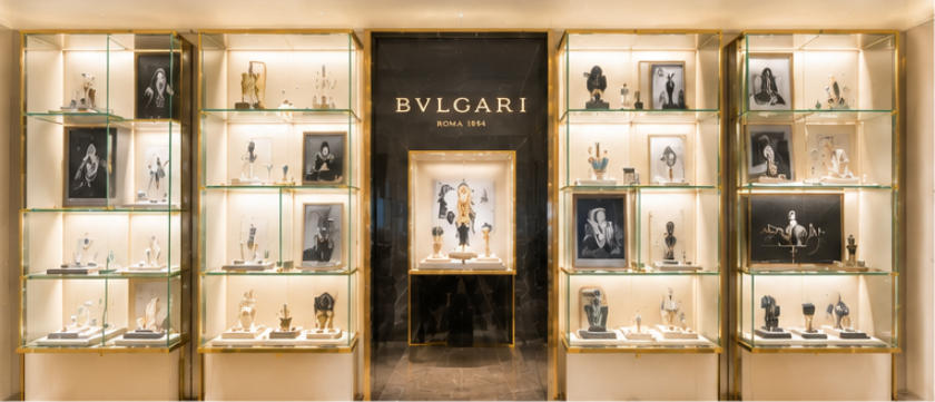 Art glass display wall for brand heritage and craft presentation