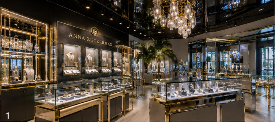 Dual-tone metal jewelry cases with chrome and gold finishing for luxury retail