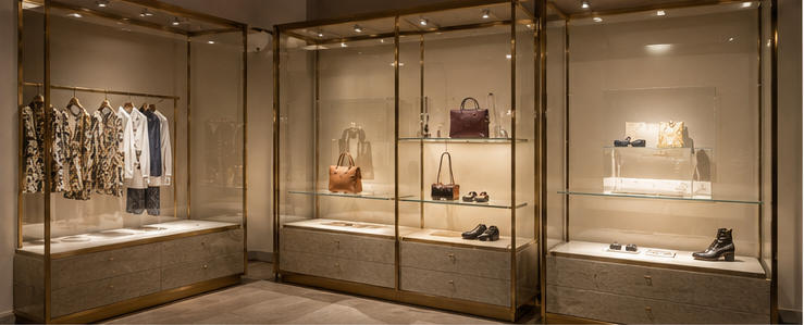 Brass stone cabinet for historic building corridor layout