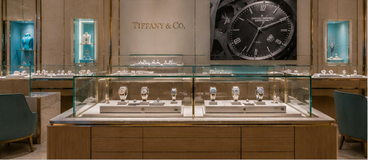 Vertical tier display racks for multi-storey retail layout